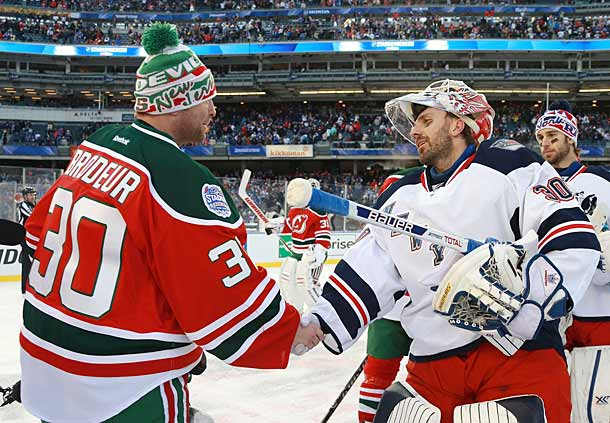 Martin Brodeur of the New Jersey Devils and Henrik Lundqvist of the New York Rangers shake hands after their outdoor game at Yankee Stadium.